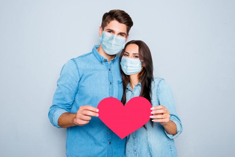 Young,Happy,Couple,In,Love,Story,Photo,Shoot,Holding,Red
