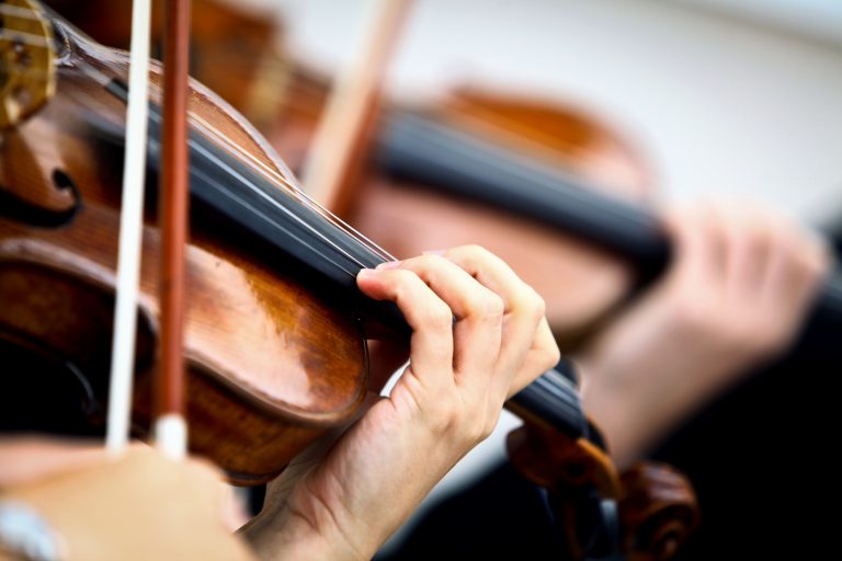 Detail,Of,Violin,Being,Played,By,A,Musician
