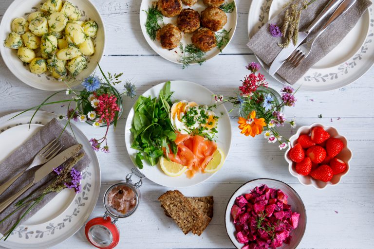 Scandinavian,Midsummer,Feast,With,Potato,Salad,,Meatballs,,Salmon,And,Beetroot