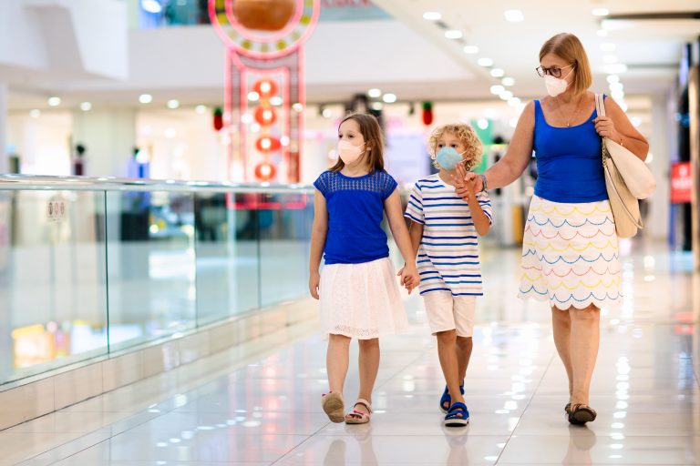 Family,Wearing,Face,Mask,In,Shopping,Mall,In,Asia.,Mother