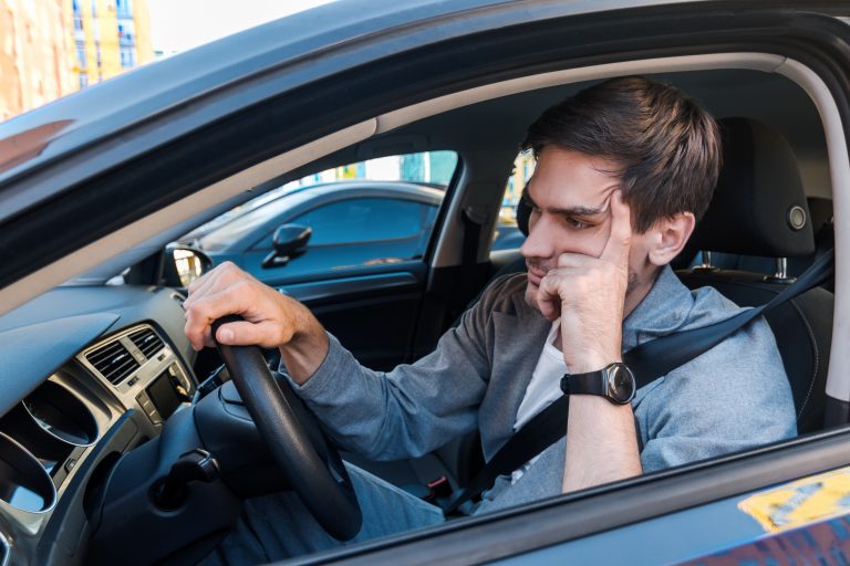 Annoyed,Tired,Young,Man,Is,Riding,Driving,Car.,Businessman,Is