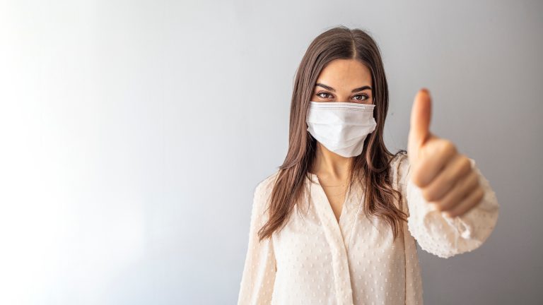 Beautiful,Caucasian,Young,Woman,With,Disposable,Face,Mask.,Protection,Versus
