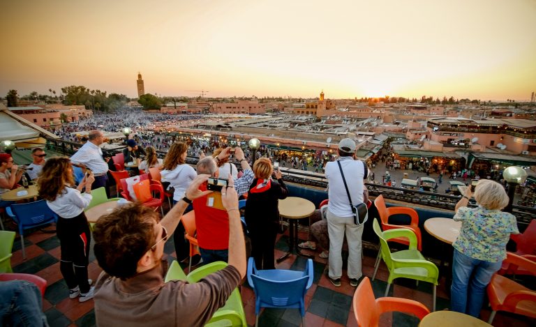 Marrakech,morocco,,June,2016:,Tourists,Taking,Pictures,At,Sunset,Over,Jama
