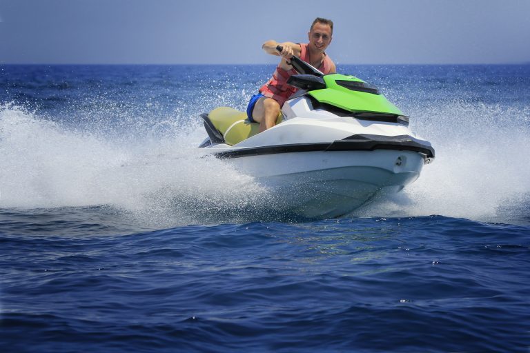 Man,Enjoy,Driving,Jetski,On,The,Ocean