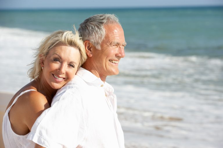 Senior,Couple,Enjoying,Beach,Holiday