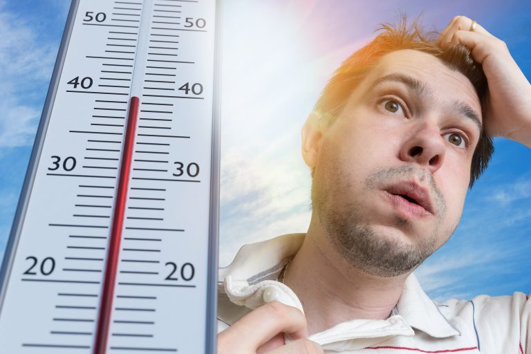 Hot,Weather,Concept.,Young,Man,Is,Sweating.,Thermometer,Is,Showing