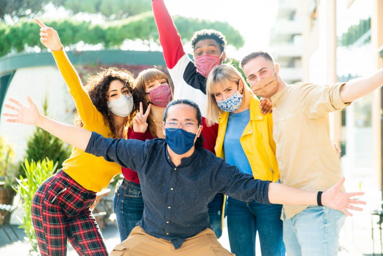 Group,Of,Multiracial,People,Wearing,Protective,Face,Masks,Smiling,At