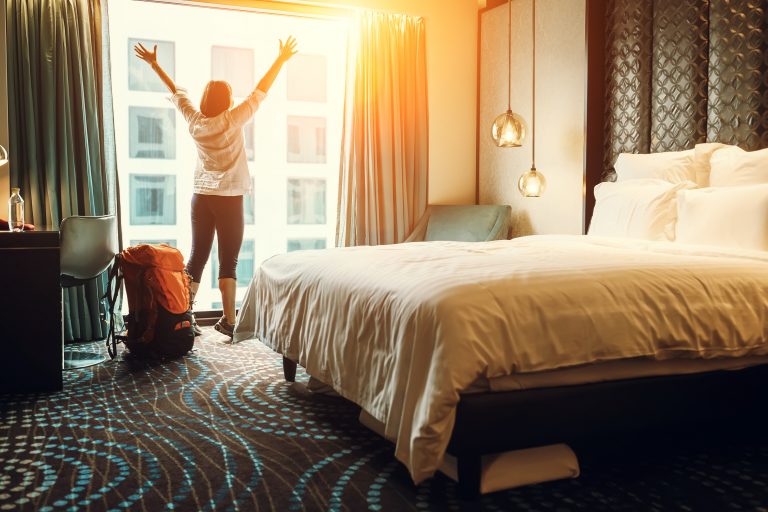 Happy,Backpacker,Traveller,Stay,In,High,Quality,Hotel