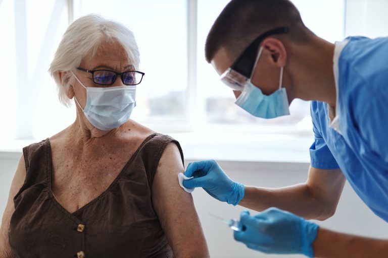Elderly,Woman,Wearing,Medical,Mask,Injection,Coronavirus,Covid-19,Passport