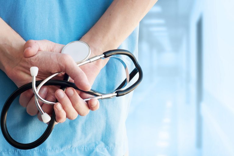 Healthcare,And,Medicine.,Doctor,With,Stethoscope,In,A,Hospital