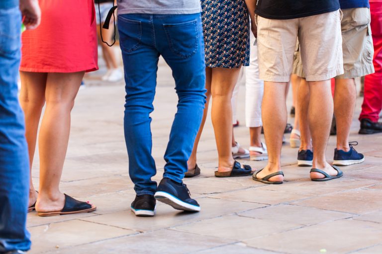 Queue,Of,People,Waiting,For,Live,Concert,From,Feet,Perspective