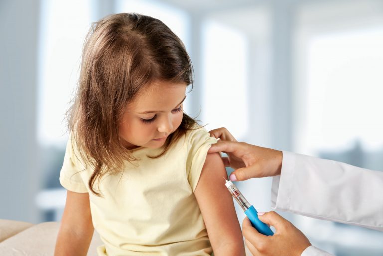 Doctor,Vaccinating,Little,Girl,Isolated,On,A