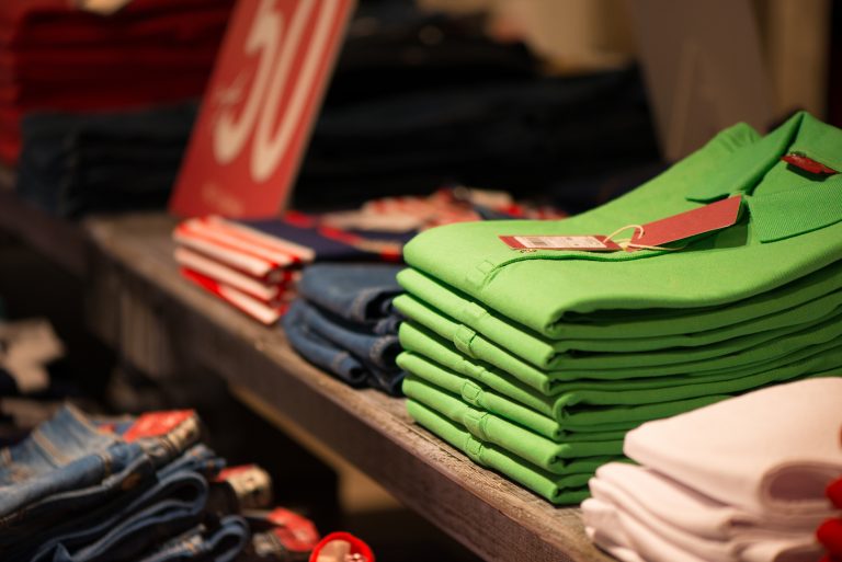 Various,Color,Shirts,At,Shelf,In,Shop
