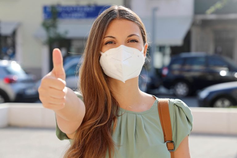 Covid-19,Optimistic,Young,Woman,Wearing,Protective,Mask,Kn95,Ffp2,Avoiding