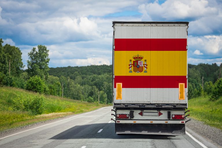 A,Truck,With,The,National,Flag,Of,Spain,Depicted,On