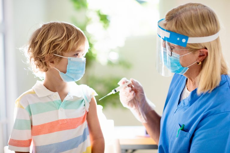 Coronavirus,Vaccination.,Covid-19,Vaccine.,Doctor,Vaccinating,Child.,Kids,At,Clinic.