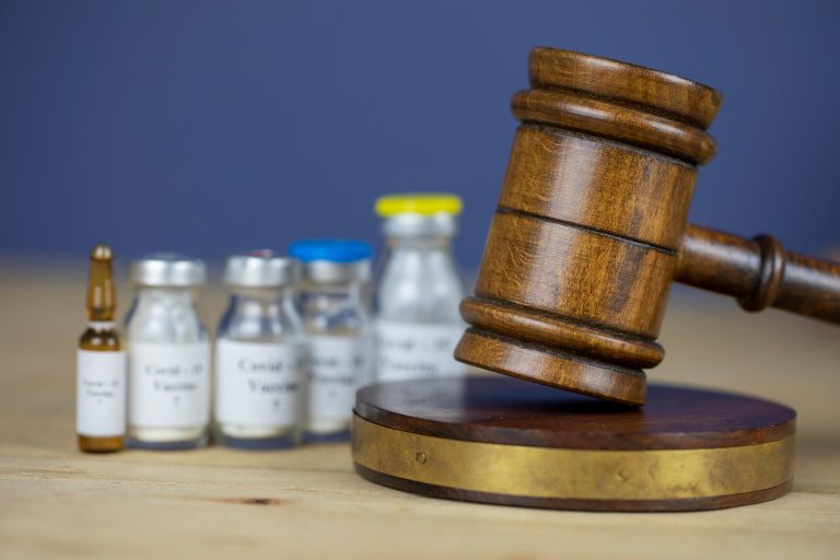 Gavel,And,Different,Vaccines,,Law,And,Vaccination,Concept
