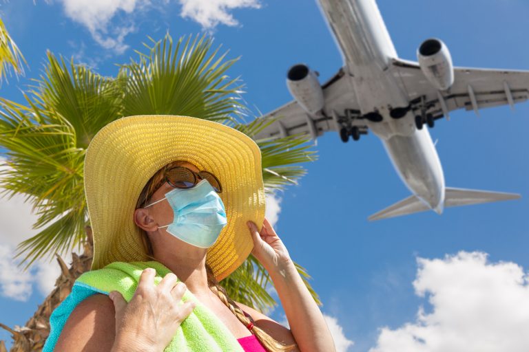 Girl,With,Towel,,Hat,,Sunglasses,And,Face,Mask,Under,Palm