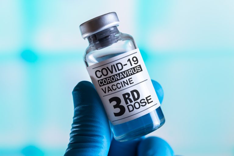 Doctor,With,Coronavirus,Vaccine,Bottle,With,The,Name,Of,The