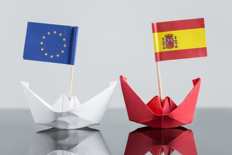 Paper,Ship,With,Spanish,And,European,Flag,,Concept,Shipment,Or