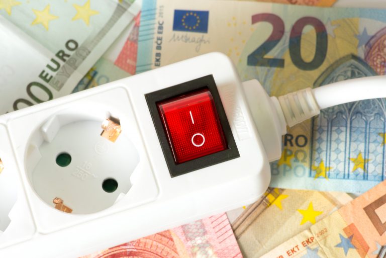Electric,Plug,And,Many,Euro,Banknotes