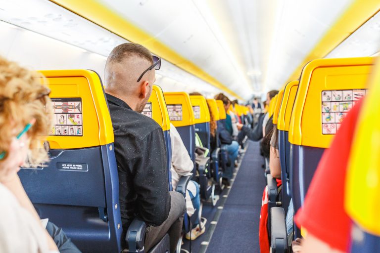 Interior,Of,Airplane,With,Passengers,On,Seats,Waiting,To,Take