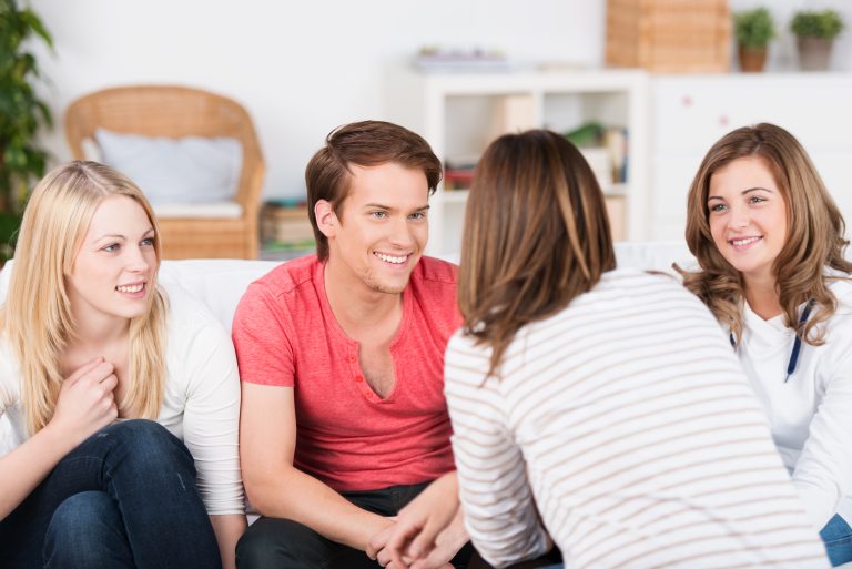 Four,Young,Attractive,Teenagers,Enjoying,A,Relaxing,Chat,Together,Sitting
