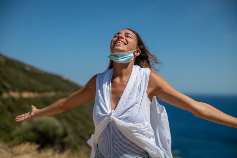 Authentic,Shot,Of,An,Young,Carefree,Woman,With,Protective,Mask