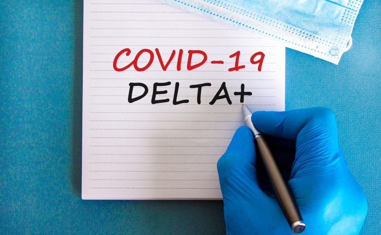 Covid-19,Delta,Plus,Variant,Strain,Symbol.,Hand,In,Blue,Glove