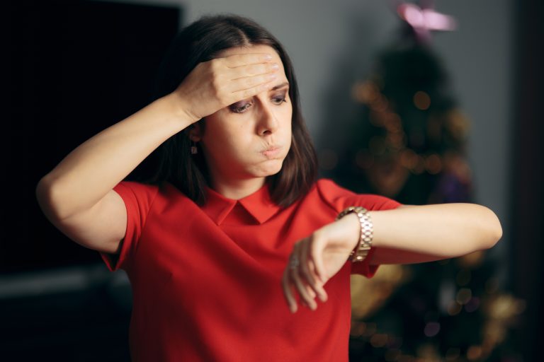 Woman,Checking,The,Time,Being,Late,For,Christmas,Party.,Girl