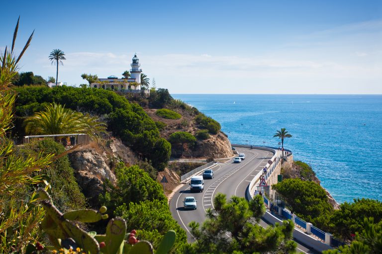 Lighthouse,,Sea,And,Road,Near,Calella,,Catalonia,,Spain