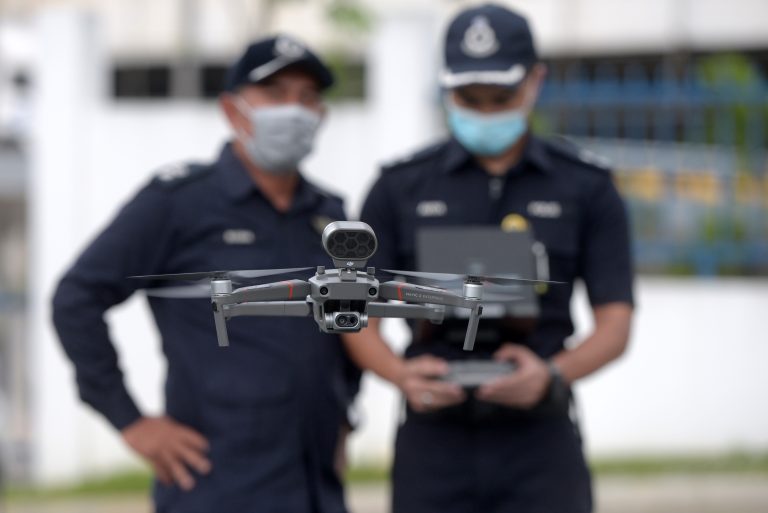 Kuala,Lumpur,,Malaysia,-,March,24,,2020:,Police,Use,Drone