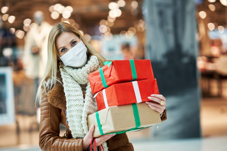 Portrait,Of,Adult,Woman,Shopping,In,Mall,Wearing,A,Mask,