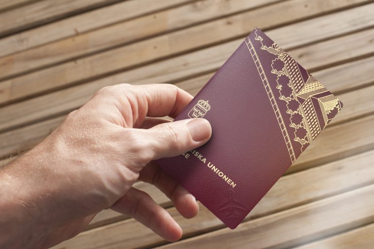 Hand,Hold,Swedish,Passport,,And,Swedish,Passports,Are,Issued,To