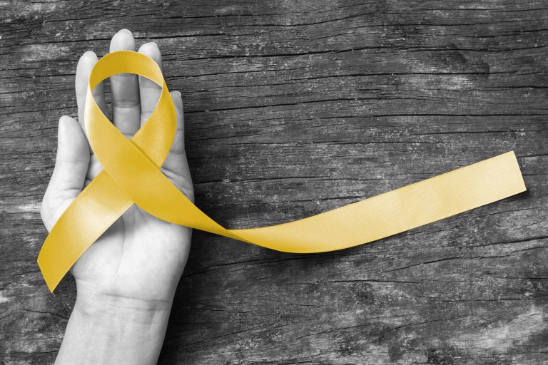 Yellow,Ribbon,Symbolic,Color,For,Sarcoma,Bone,Cancer,,Bladder,Cancer,