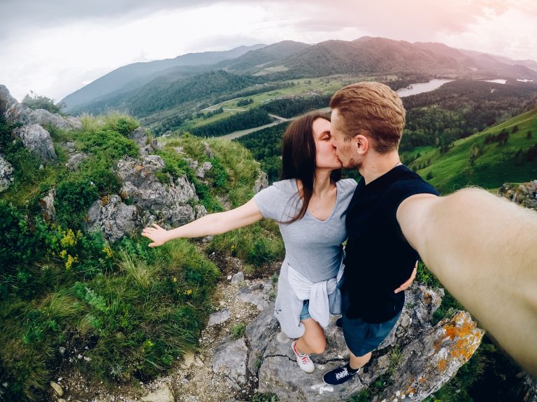 Guy,And,Girl,Tourists,Are,Happy,,Hug,And,Do,Selfie