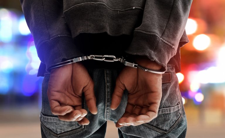 Man,In,Handcuffs