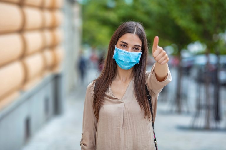 Portrait,Of,Young,Woman,Wearing,Face,Protective,Mask,To,Prevent