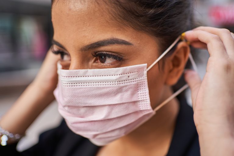Covid-19,Pandemic,Coronavirus,Woman,In,City,Street,Wearing,Face,Mask