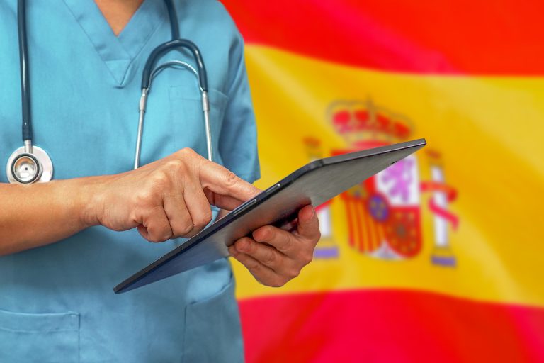 Surgeon,Or,Doctor,Using,A,Digital,Tablet,On,The,Background