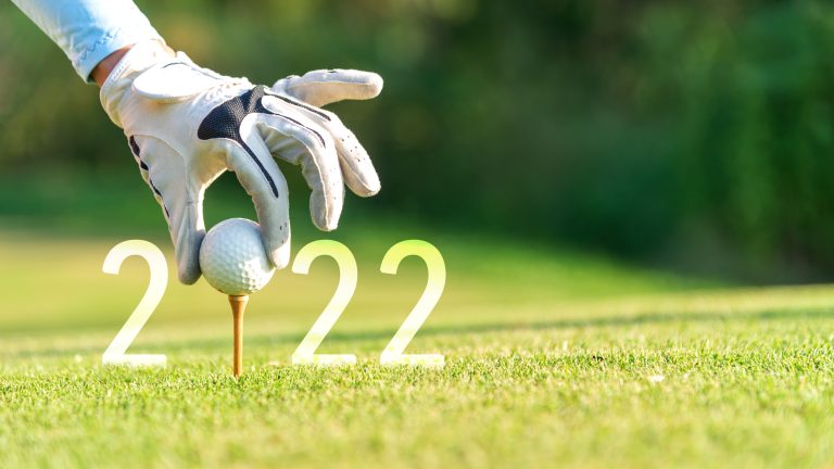 Close,Up,Hand,Golfer,Woman,Putting,Golf,Ball,For,Happy