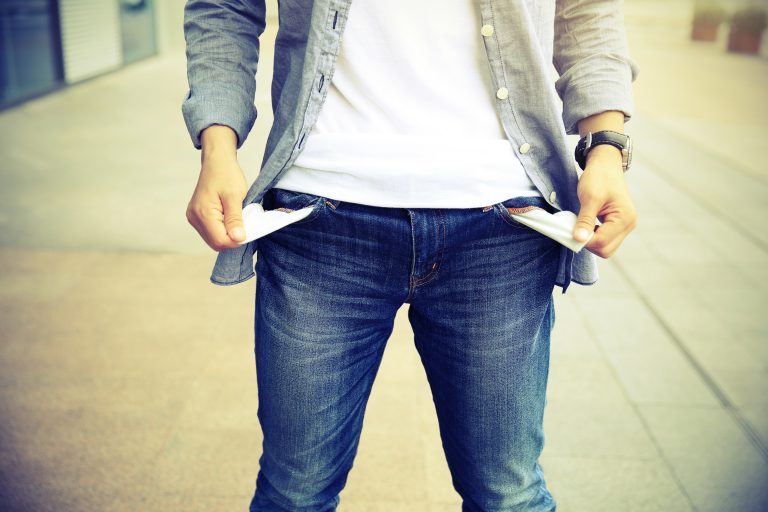 People,Showing,Has,No,Money,By,Turning,Out,The,Pocket