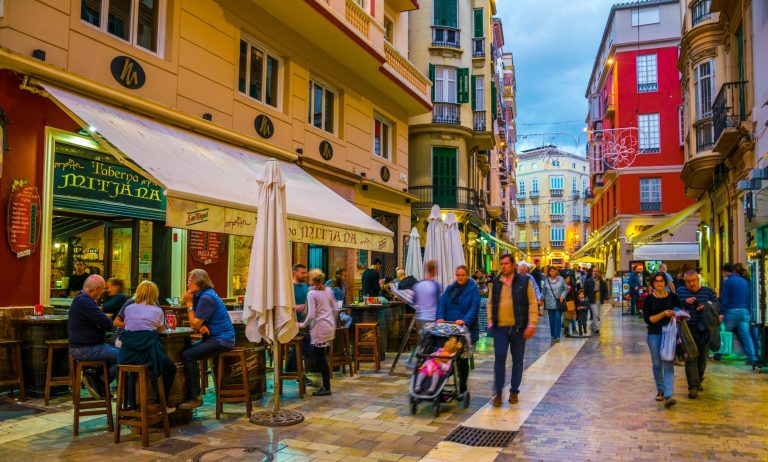 Malaga,,Spain,,January,4,,2016:,Crowds,Of,Tourists,Are,Strolling