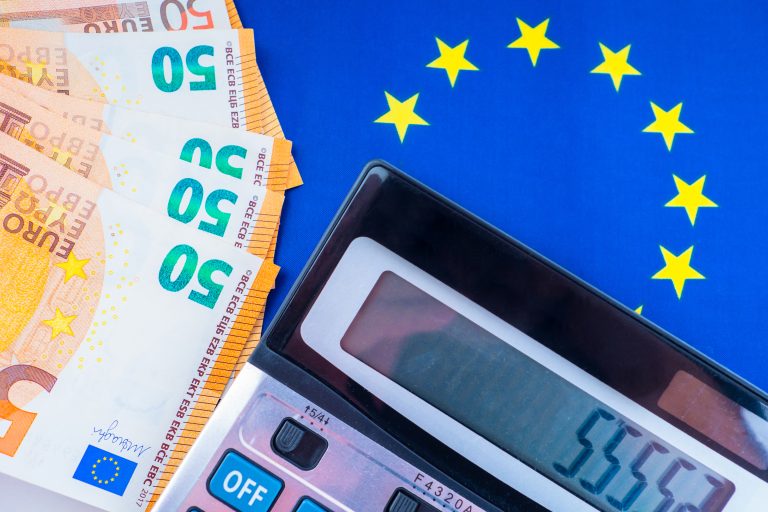 Banknotes,,The,Eu,Flag,And,A,Calculator.,Financial,Indicators,Of