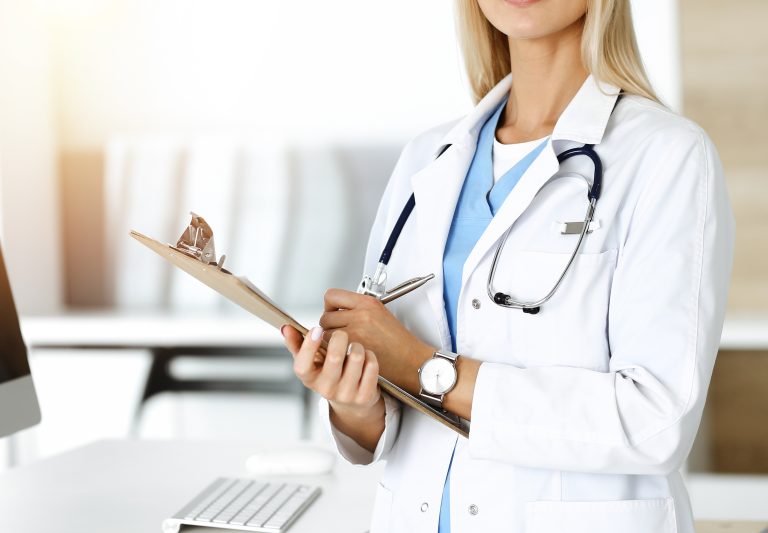 Unknown,Woman-doctor,At,Work,In,Sunny,Clinic.,Female,Physician,Controls