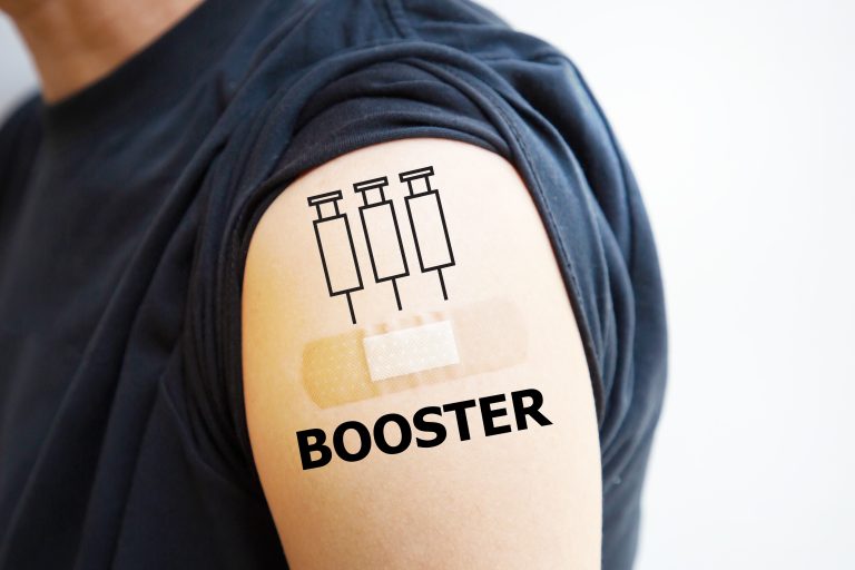 Man,Showing,Vaccinated,Shoulder,With,Third,Shots,Or,Booster,Shots