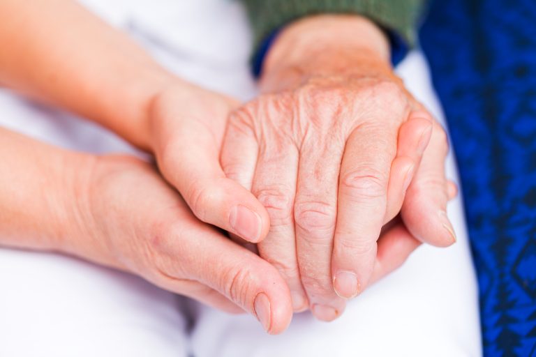 Young,Carer,Giving,Helping,Hands,For,Elderly,Woman