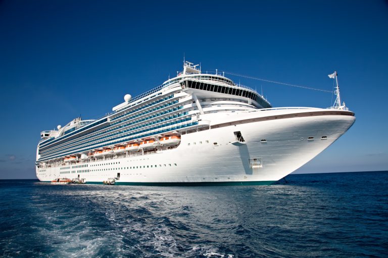 Cruise,Ship,Anchored,In,The,Caribbean