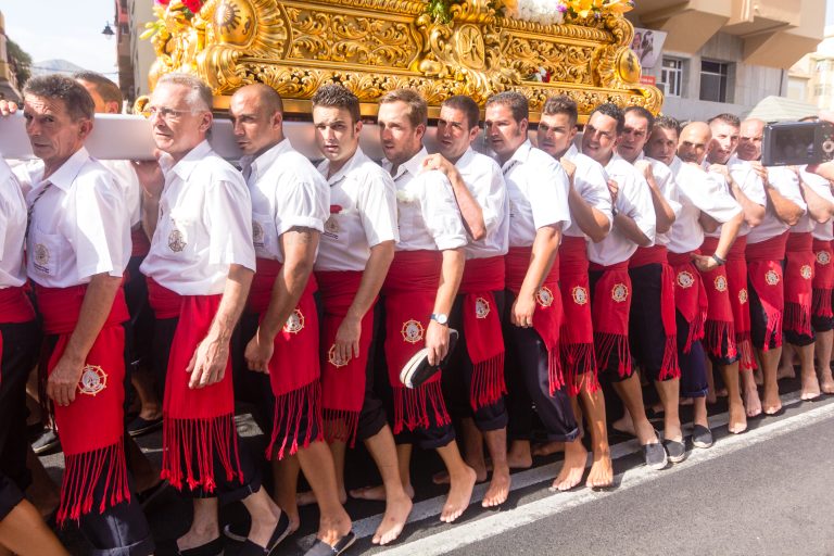 Malaga,,Spain,-,July,16:,Unidentified,Barefoot,Worshippers,Carry,A