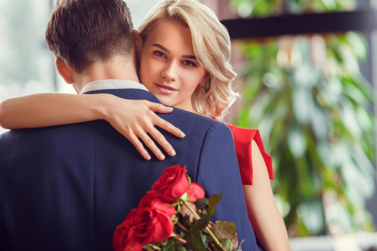 Young,Man,And,Woman,On,Date,In,Restaurant,Dancing,Together
